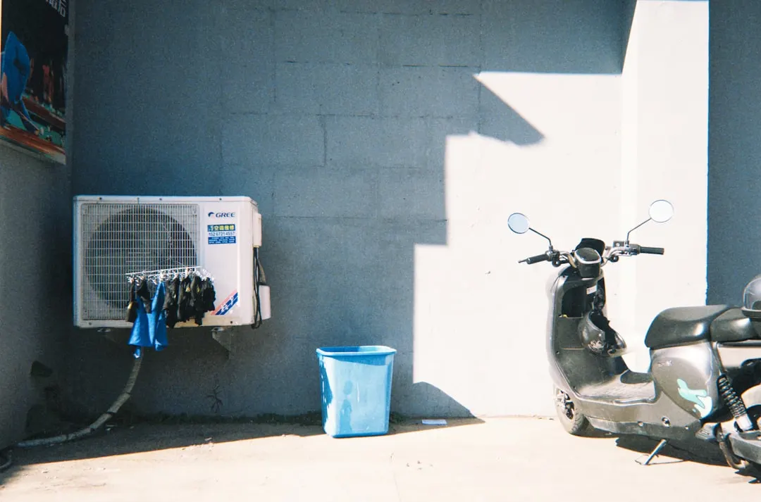 AC tune-up service on residential outdoor unit in Atlanta