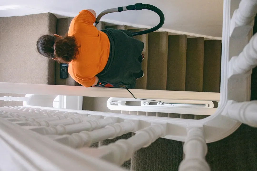 Duct cleaning technician with HEPA vacuum in Atlanta