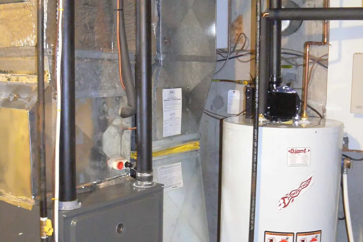 New high-efficiency gas furnace installed in a Atlanta basement mechanical room