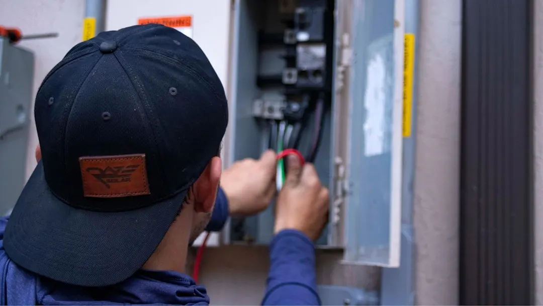 Atlanta Air Conditioning technician installing a high-efficiency furnace